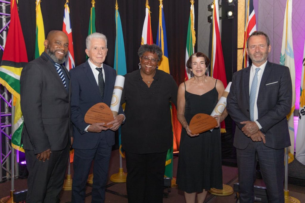 Photo of CBU Hall of Fame inductees with CBU President and PM of Barbados at the AGA 56 Opening Ceremony